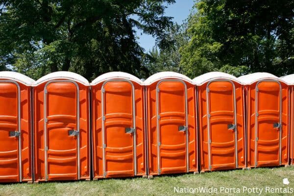 a lineup of clean and well-maintained portable loos for workers in Norway, SC